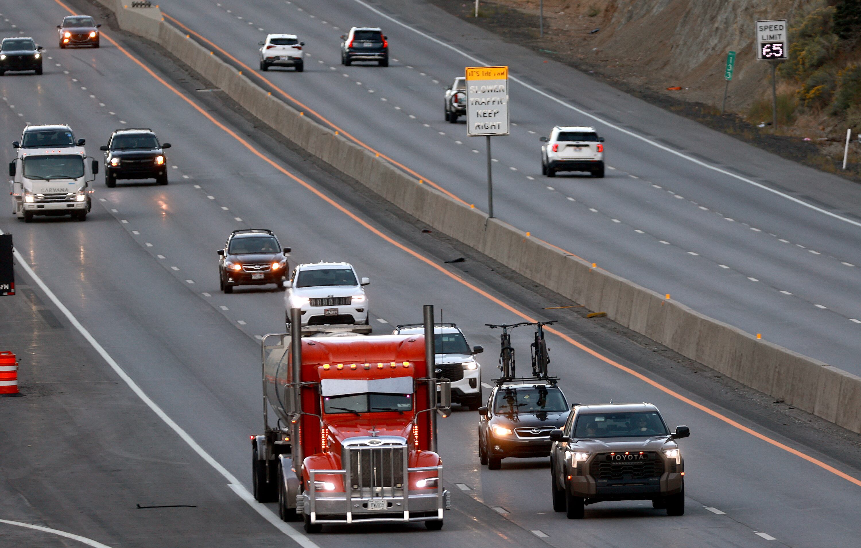 Traffic moves through Parleys Canyon on Labor Day, Monday. Rising fuel prices are continuing to bite consumers at the pump.
