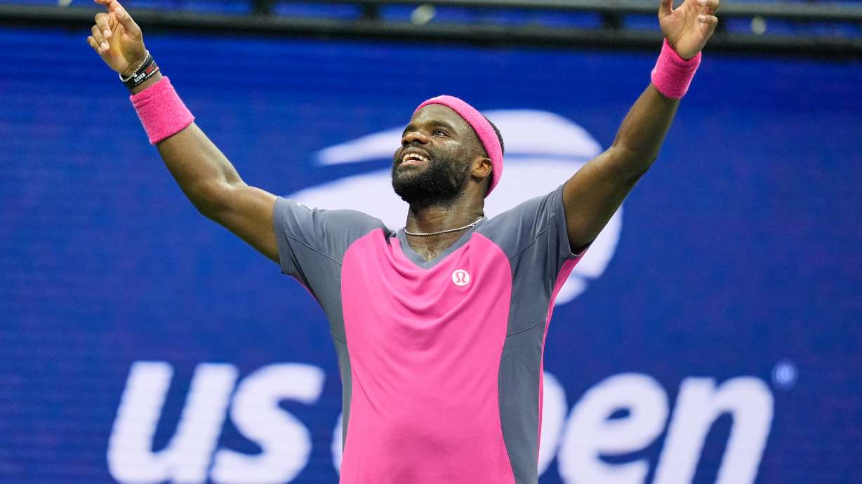 Frances Tiafoe, of the United States, celebrates winning a match against Alex Michelsen, of the United States, during the quarterfinal round of the U.S. Open tennis championships, Tuesday, Sept. 8, 2026, in New York.