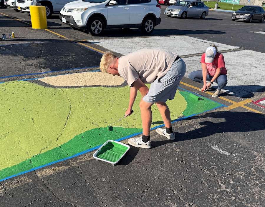 Parking lot art done by an Idaho Falls high school senior on display on Monday.