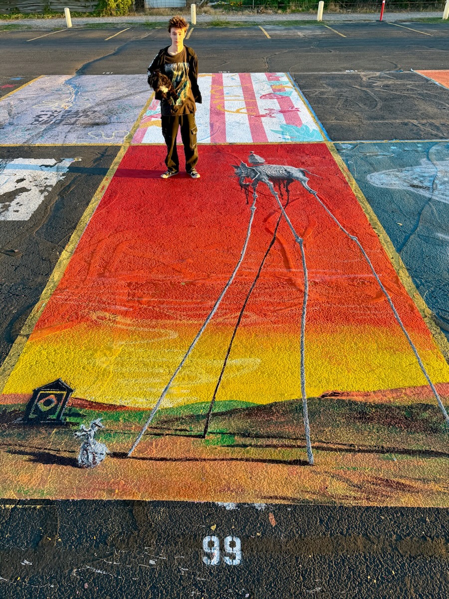 Parking lot art done by an Idaho Falls high school senior on display on Monday.