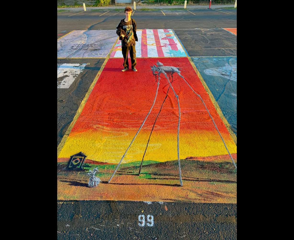 Parking lot art done by an Idaho Falls high school senior on display on Monday.