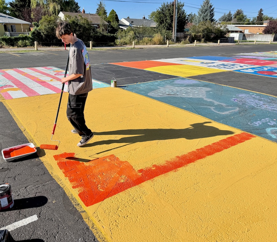 Parking lot art done by an Idaho Falls high school senior on display on Monday.