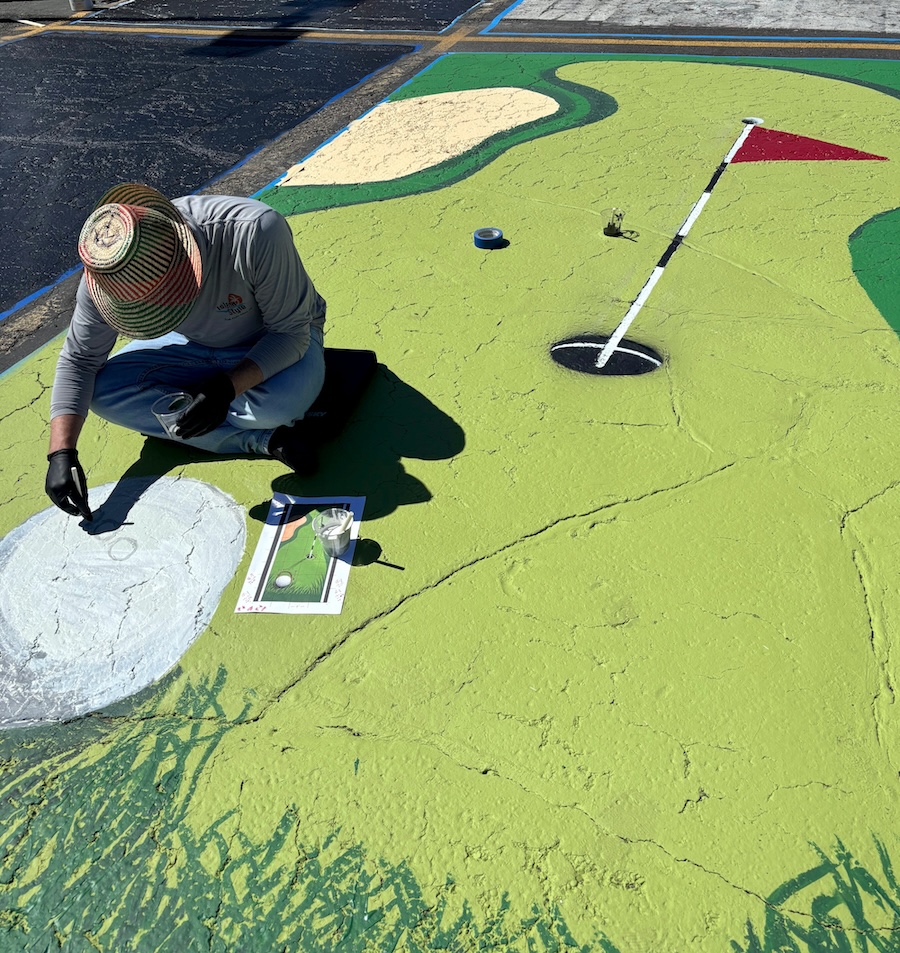Parking lot art done by an Idaho Falls high school senior on display on Monday.