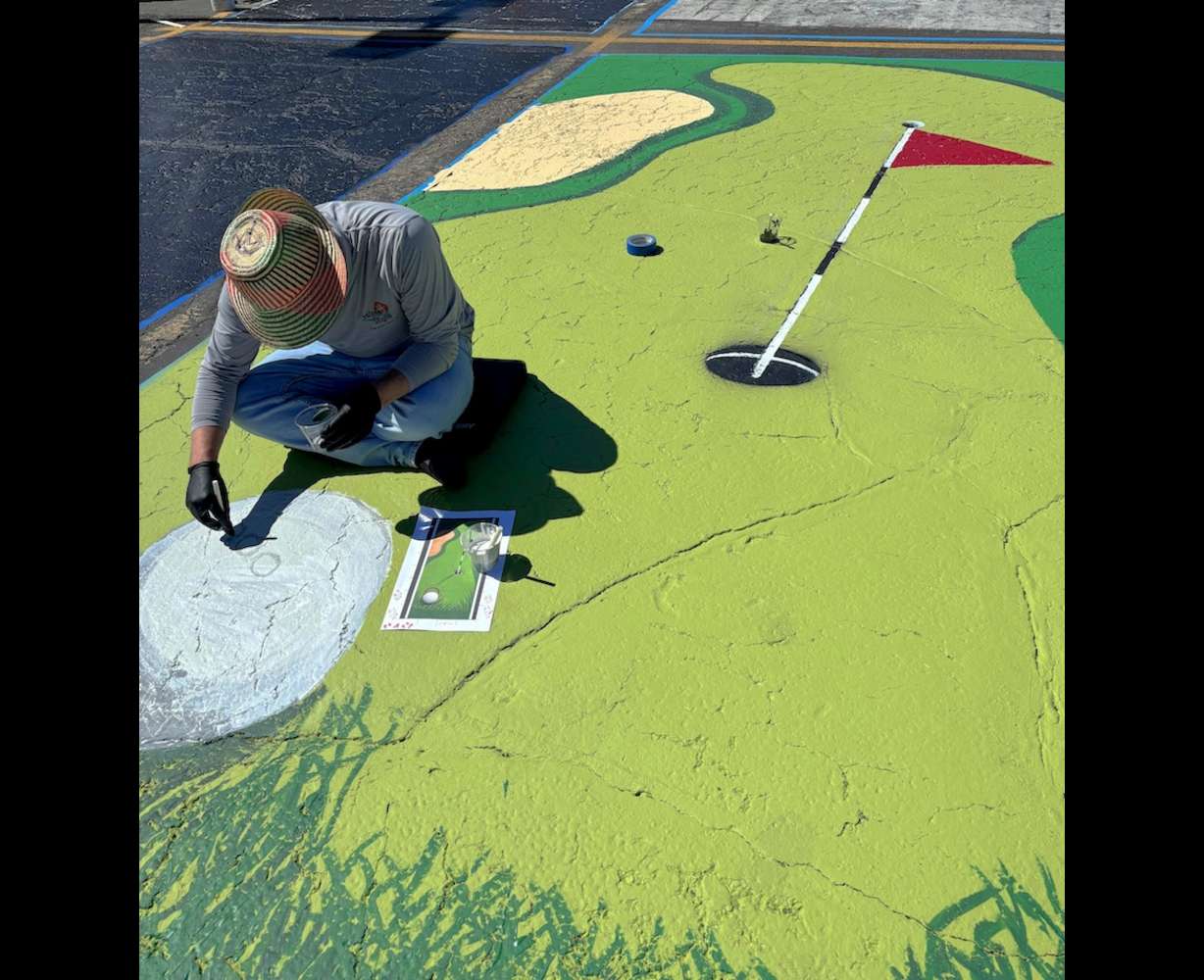 Parking lot art done by an Idaho Falls high school senior on display on Monday.
