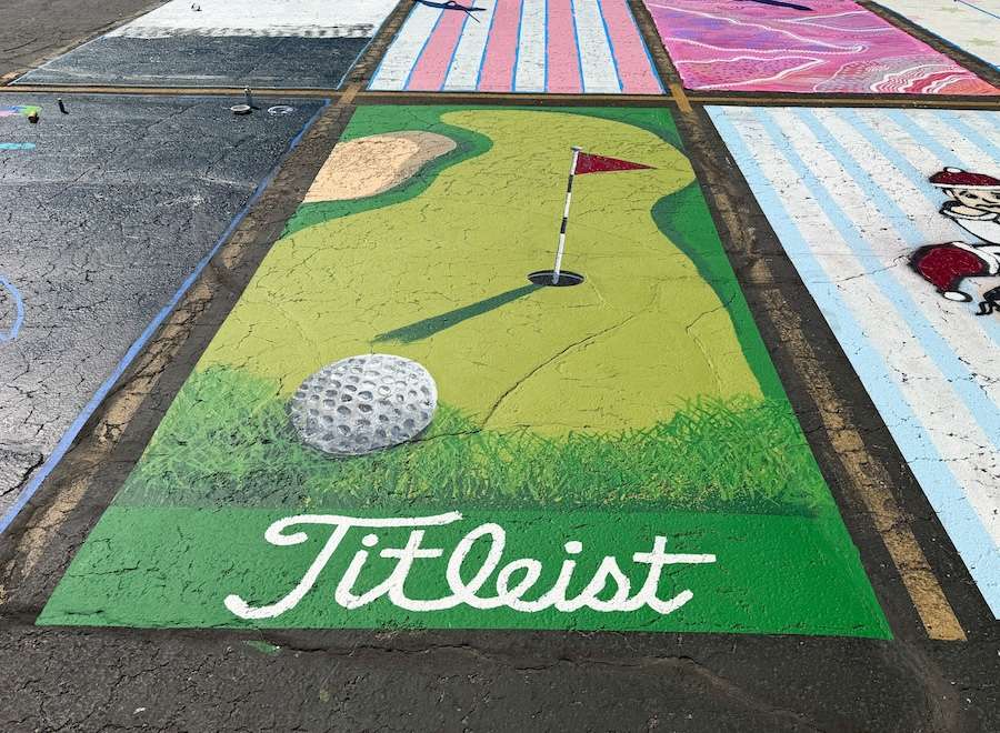 Parking lot art done by an Idaho Falls high school senior on display on Monday.