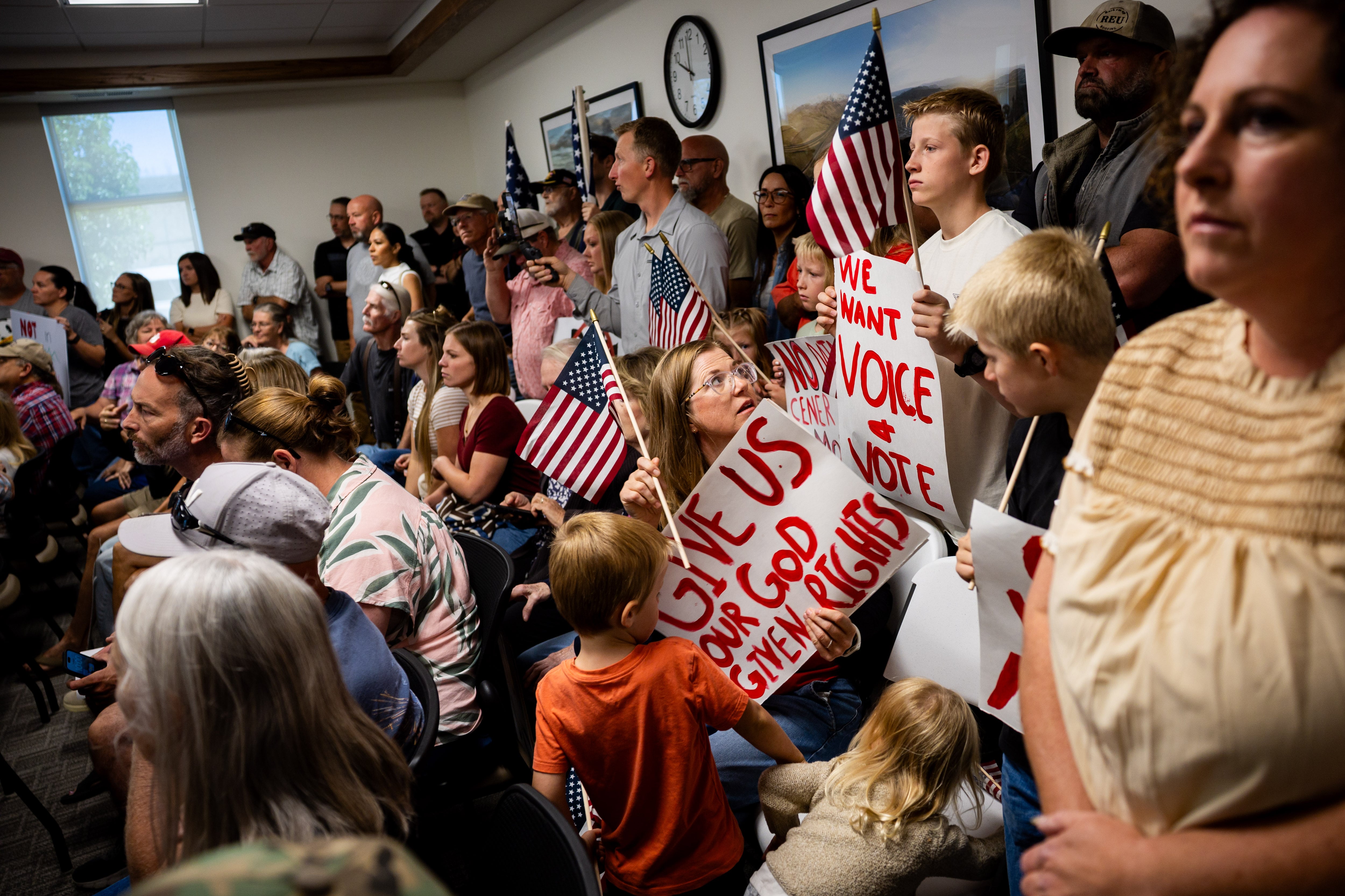 People arrive to protest the proposed data center just outside of Mona during the public comment portion of the Juab County Commission meeting at Rocky Ridge Town Hall in Rocky Ridge on Tuesday.