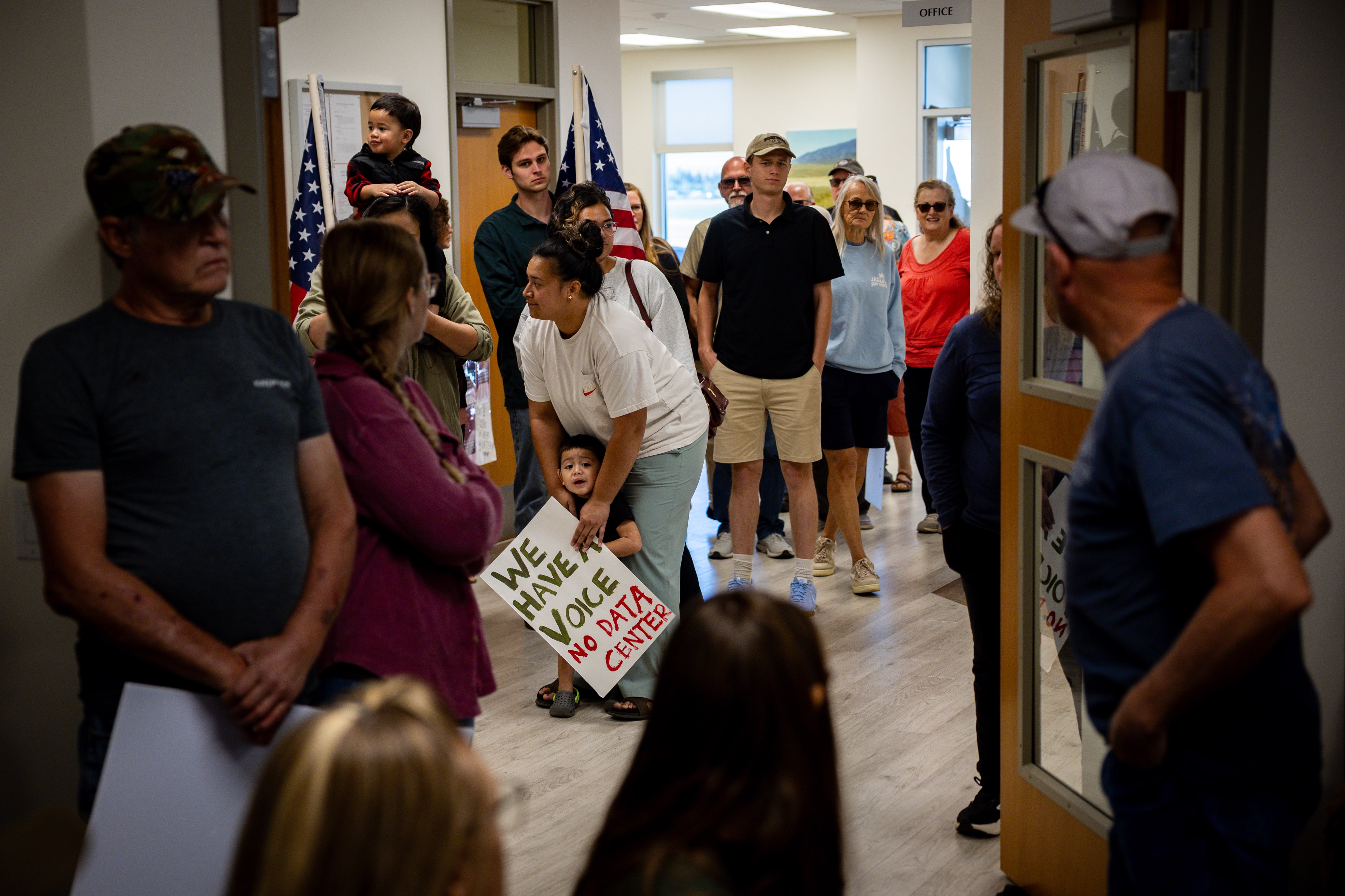 People arrive to protest the proposed data center just outside of Mona during the public comment portion of the Juab County Commission meeting at Rocky Ridge Town Hall in Rocky Ridge on Tuesday.