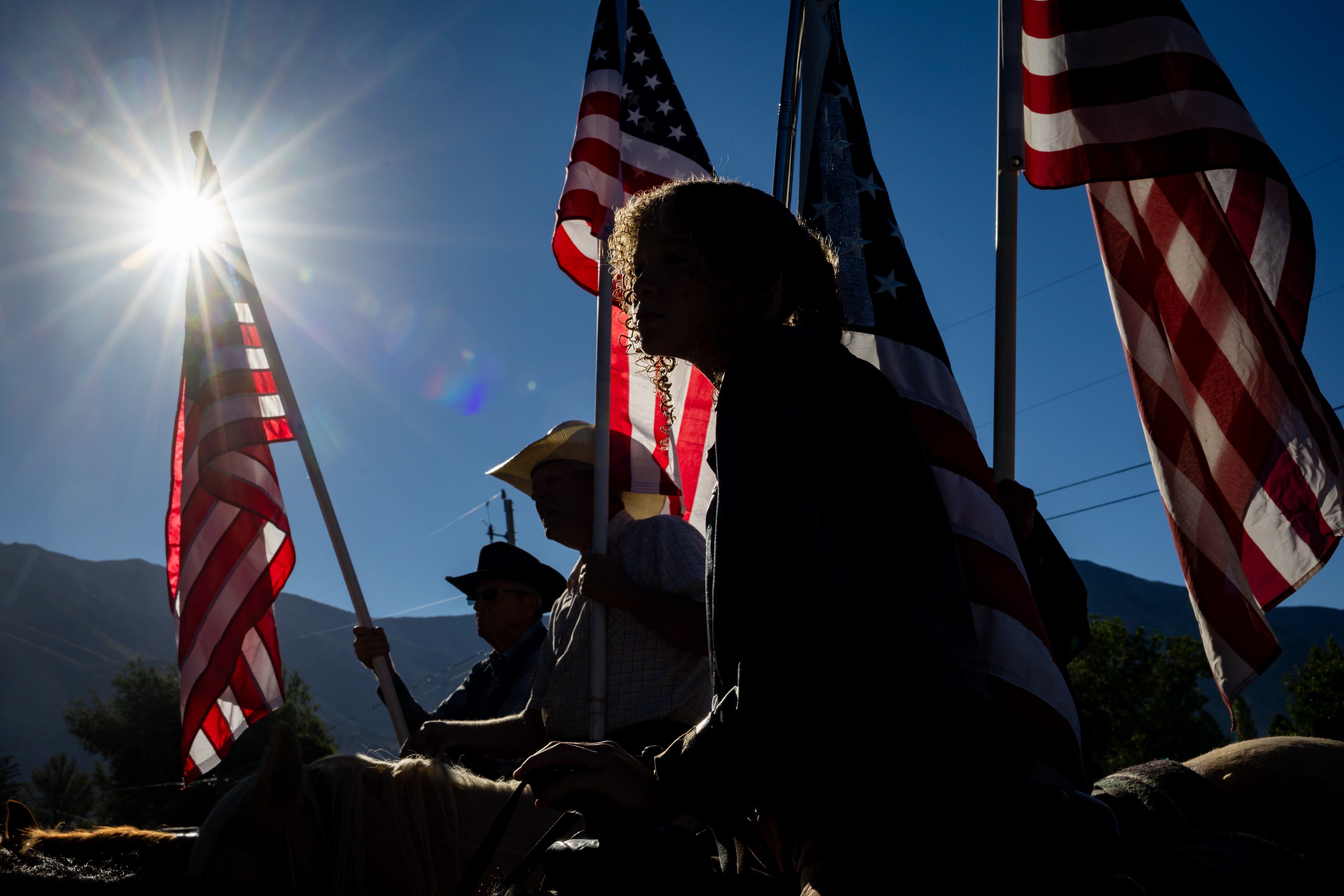 Ivy Flake, 11, center, and others gather outside the Mona City Center before riding on their horses to protest the proposed data center just outside of Mona during the public comment portion of the Juab County Commission meeting at Rocky Ridge Town Hall in Rocky Ridge on Tuesday.