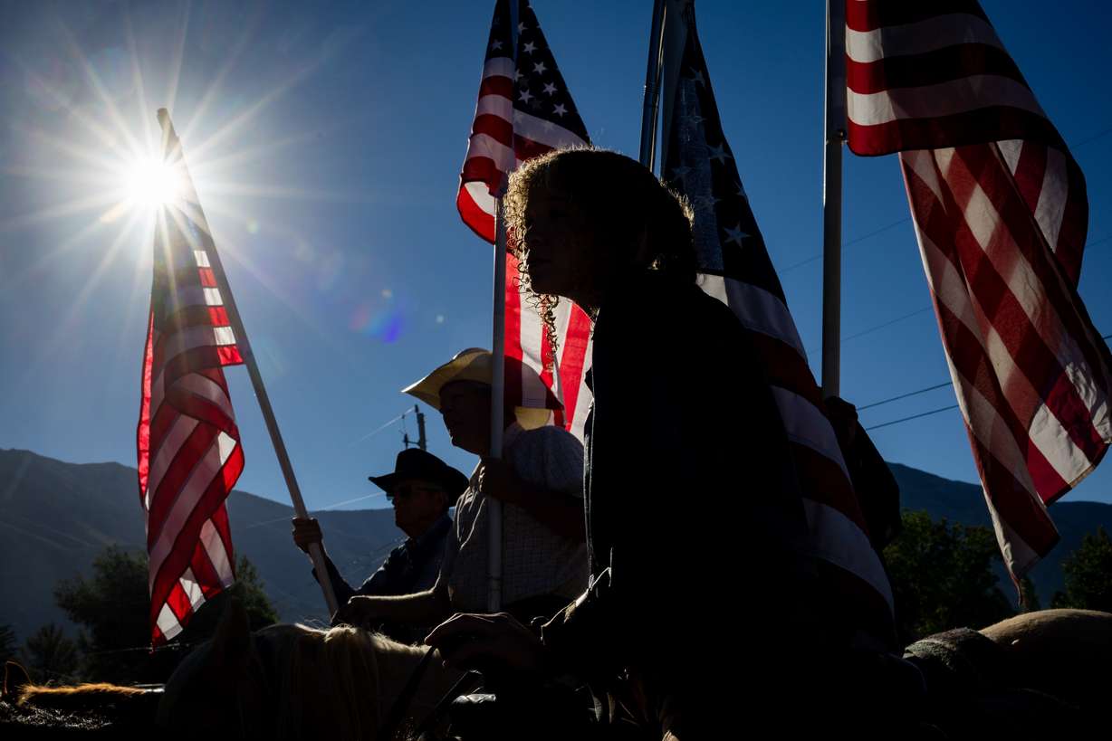 Ivy Flake, 11, center, and others gather outside the Mona City Center before riding on their horses to protest the proposed data center just outside of Mona during the public comment portion of the Juab County Commission meeting at Rocky Ridge Town Hall in Rocky Ridge on Tuesday.
