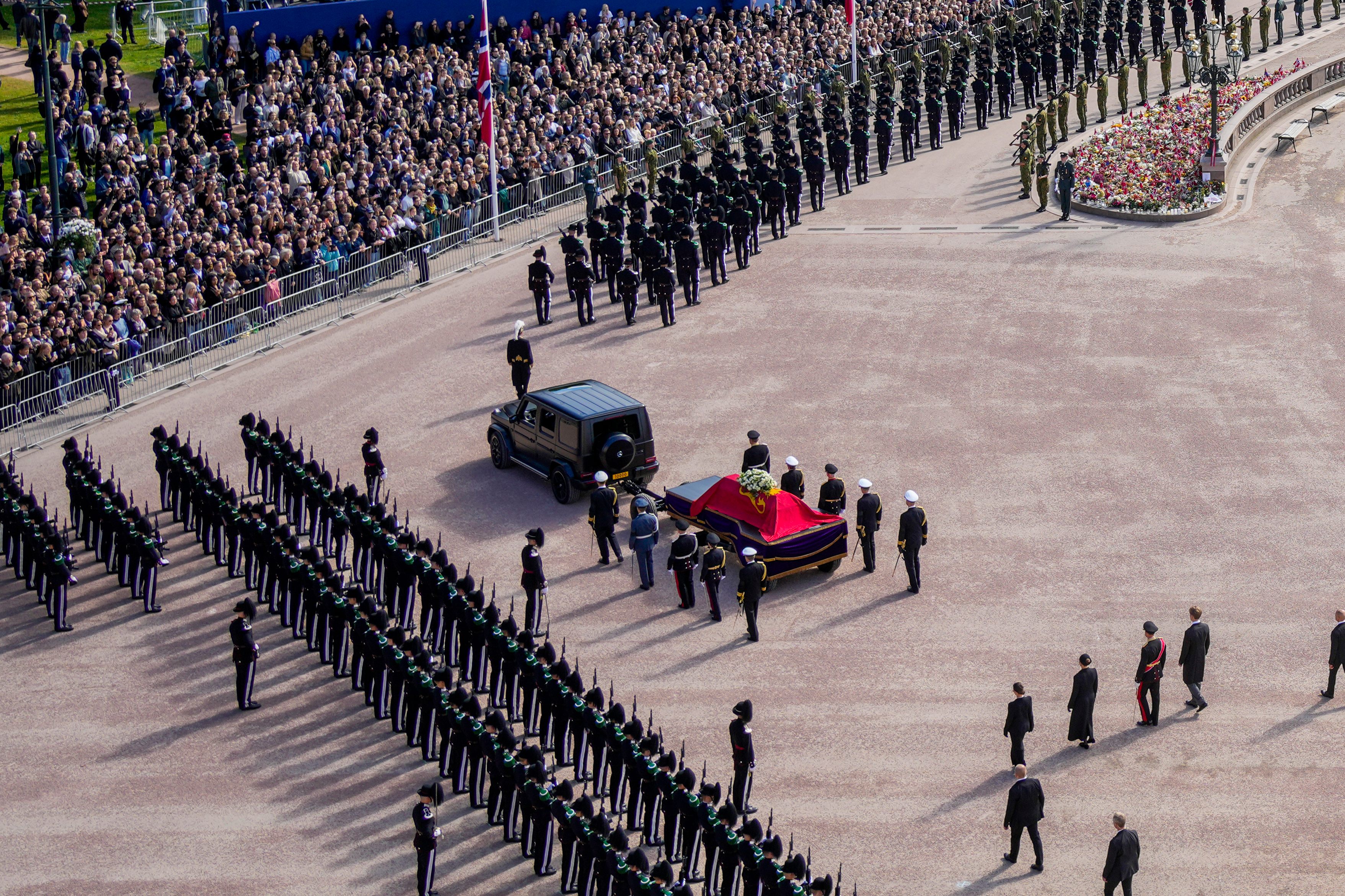 The coffin of King Harald V is taken in procession from the Royal Palace to Oslo Cathedral, in Oslo, Norway on Wednesday.