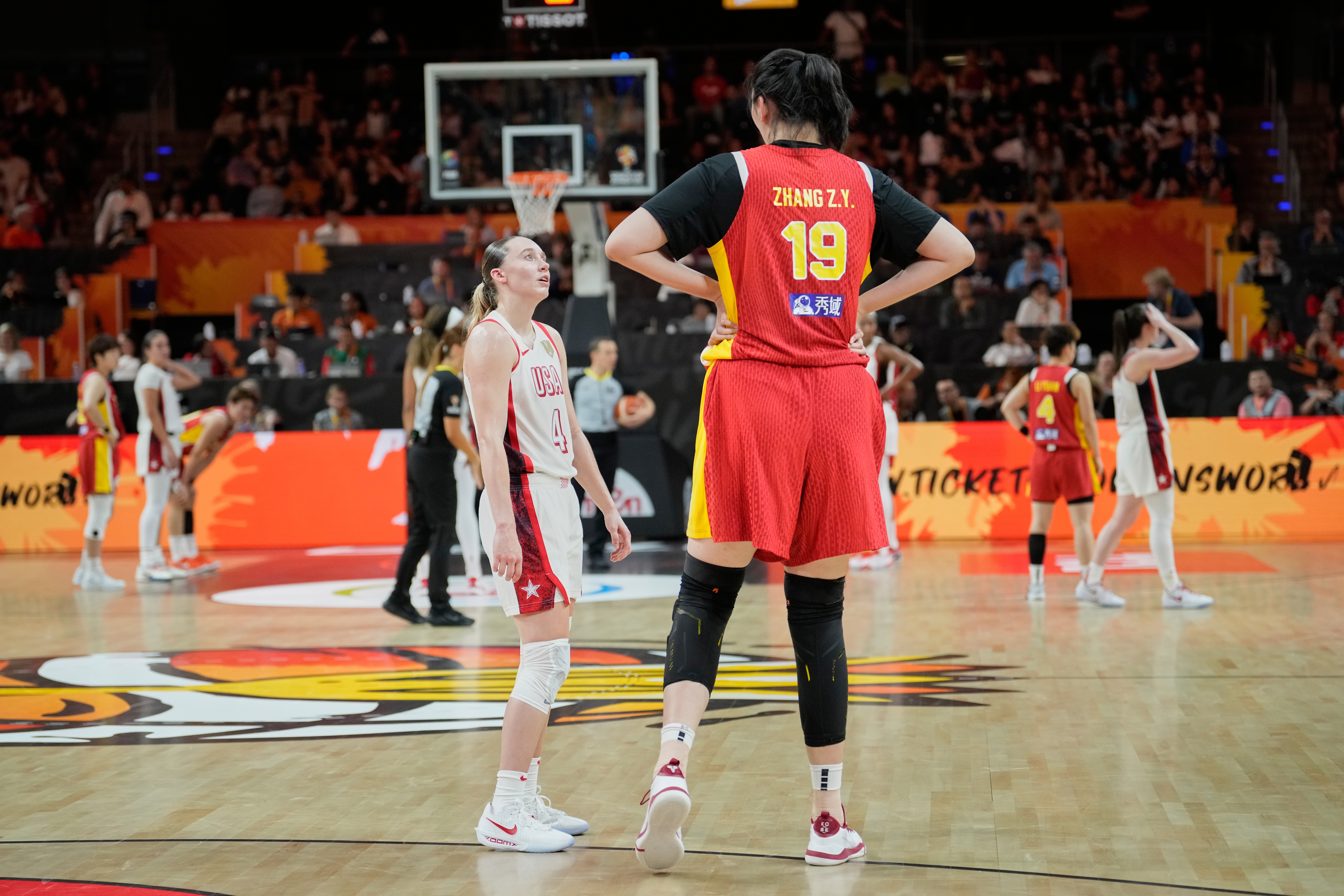 United States' Paige Bueckers talks to China's Zhang Ziyu during the Women's Basketball World Cup match between China and the United States in Berlin, Friday, Sept. 4, 2026. 