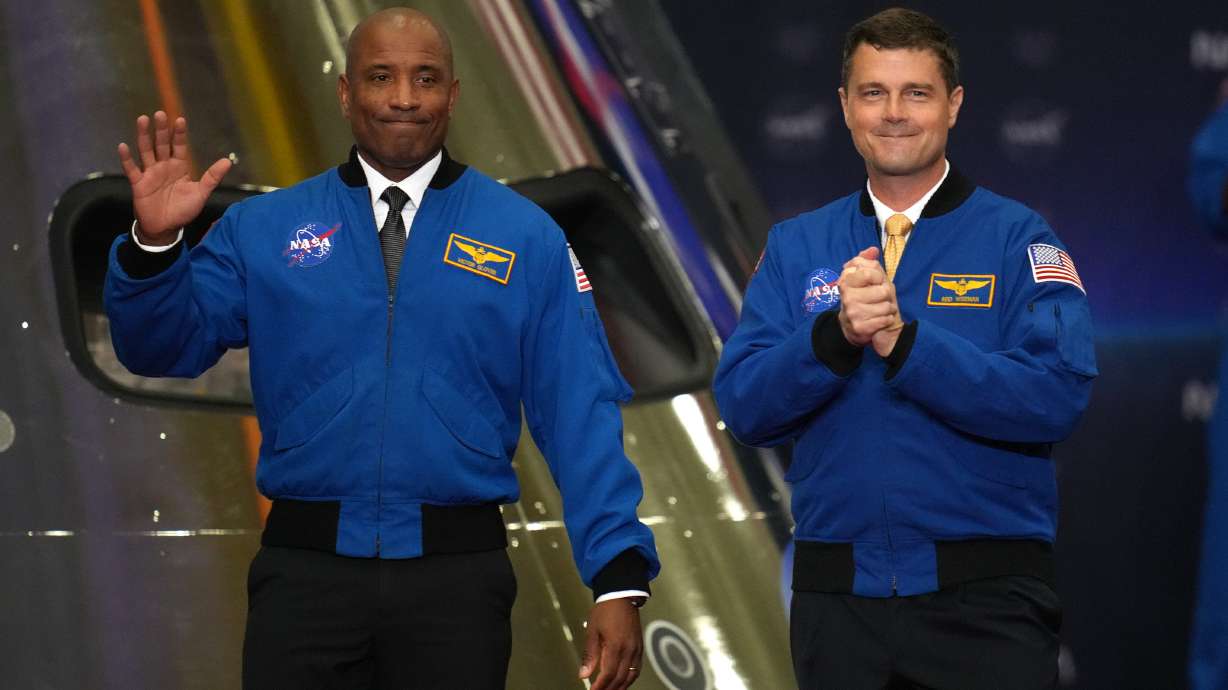 Artemis II pilot Victor Glover and Cmdr. Reid Wiseman participate in a Congressional Space Medal of Honor ceremony at NASA's Johnson Space Center, Aug. 28, in Houston. Both announced they were stepping away from spaceflight on Wednesday.