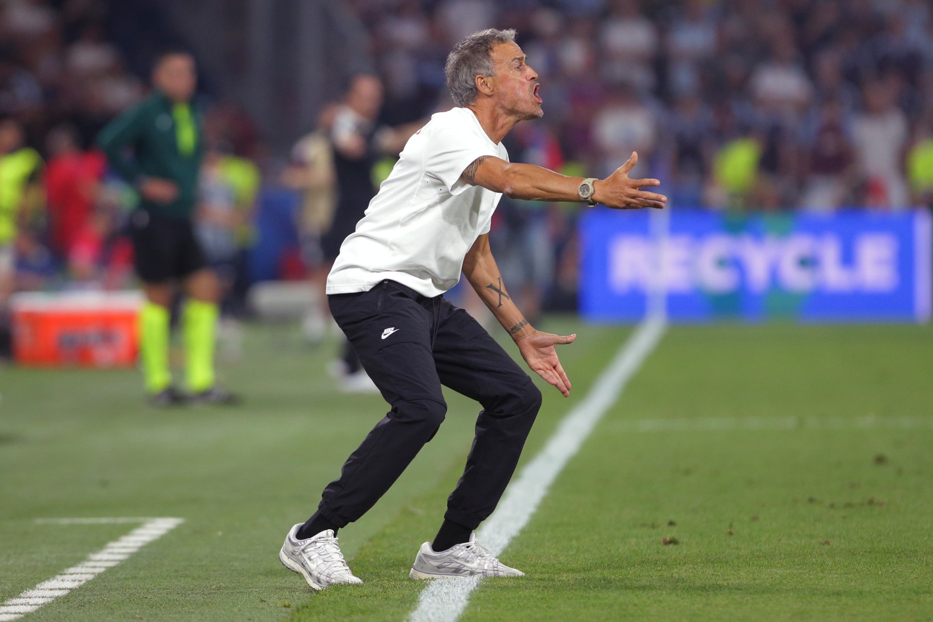 PSG's head coach Luis Enrique instructs his players during the UEFA Super Cup soccer match between Paris Saint-Germain and Aston Villa in Salzburg, Austria, Wednesday, Aug. 12, 2026. 