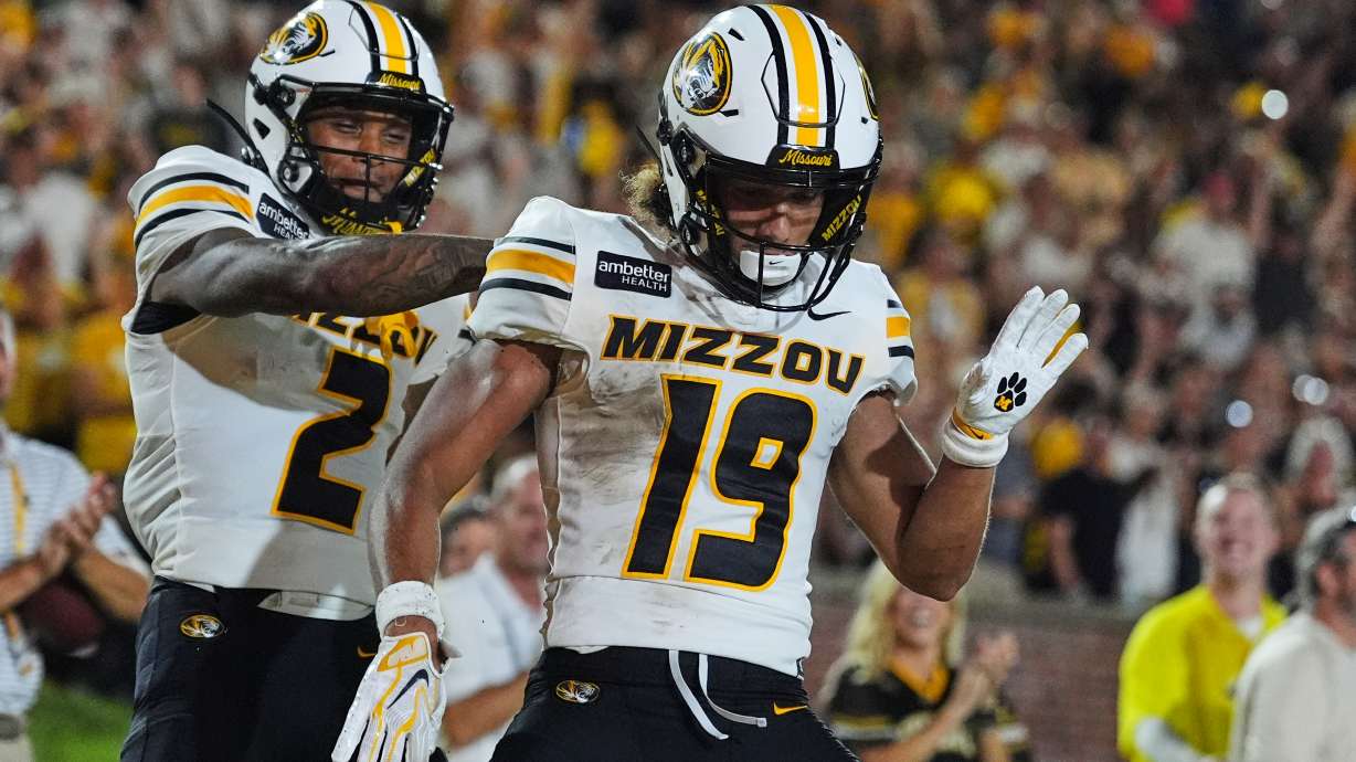 Missouri wide receiver Cayden Lee, right, is congratulated by Caleb Goodie Sr. (2) after scoring during the first half of an NCAA college football game against Arkansas-Pine Bluff Thursday, Sept. 3, 2026, in Columbia, Mo.