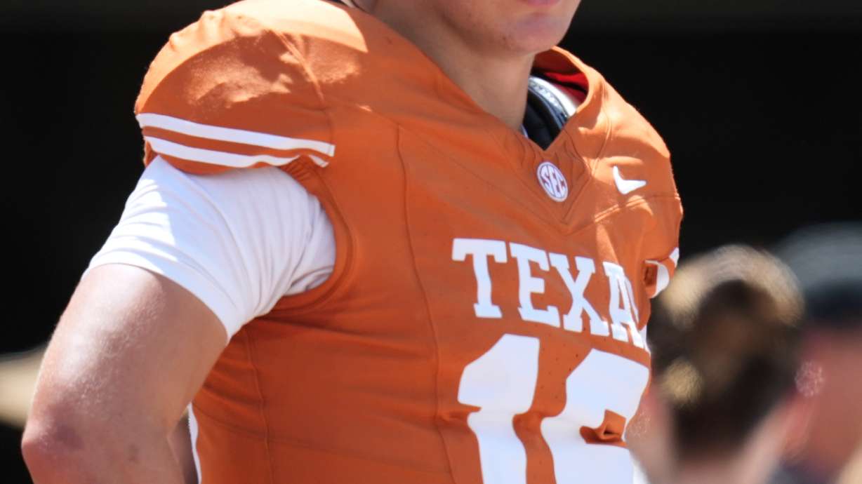 Texas quarterback Arch Manning warms up before an NCAA college football game against Texas State in Austin, Texas, Saturday, Sept. 5, 2026.