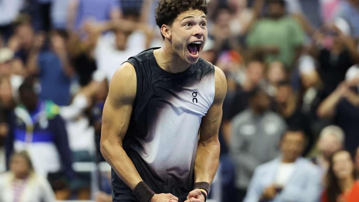 Ben Shelton, of the United States, celebrates after winning against Carlos Alcaraz, of Spain, inthe quarterfinal round of the U.S. Open tennis championships, Wednesday, Sept. 9, 2026, in New York.