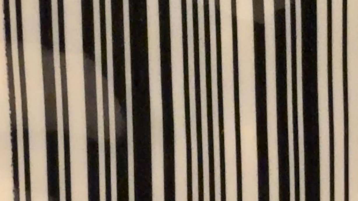 A traditional UPC barcode printed on product packaging.