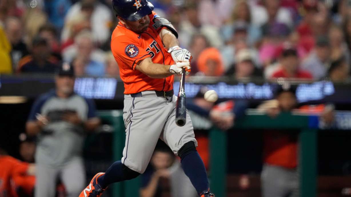 Houston Astros' Jose Altuve hits a double against Philadelphia Phillies pitcher Cristopher Sánchez for his 2,500th career hit during the third inning of a baseball game Wednesday, Sept. 9, 2026, in Philadelphia.