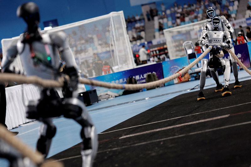 Exclusive-After outrunning Bolt, China's robot champion races towards real-world work