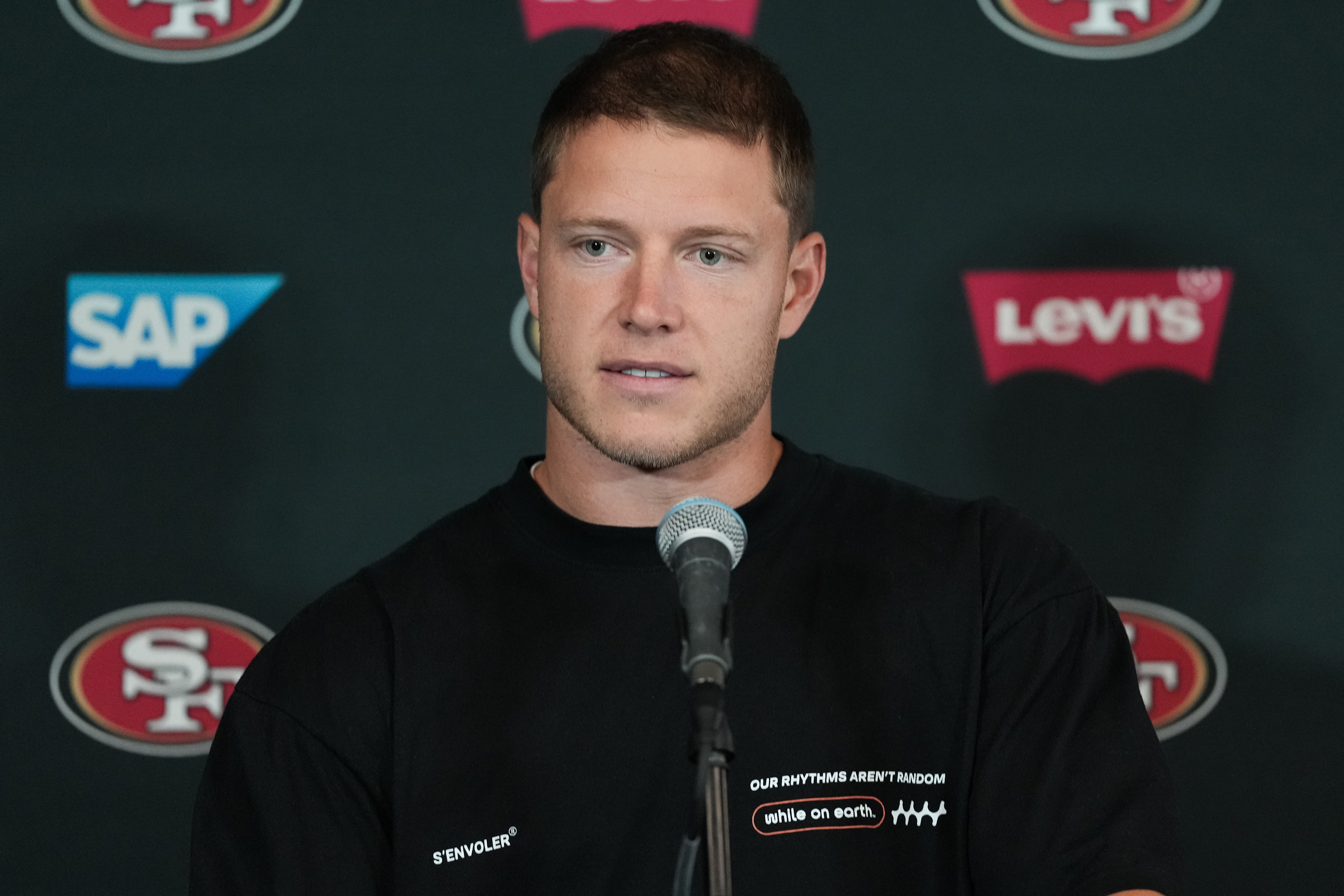 San Francisco 49ers running back Christian McCaffrey speaks to the media ahead of practice Monday, Sept. 7, 2026, in Melbourne, Australia, in preparation for an NFL football game against the Los Angeles, Rams. 