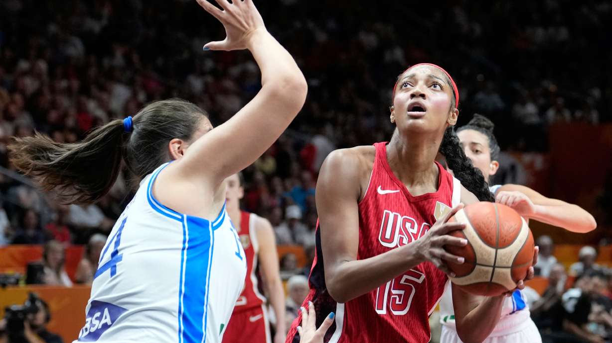 Italy's Sara Madera guards Angel Reese, of the United States, during the Women's Basketball World Cup match between the United States and Italy in Berlin, Sunday, Sept. 6, 2026.