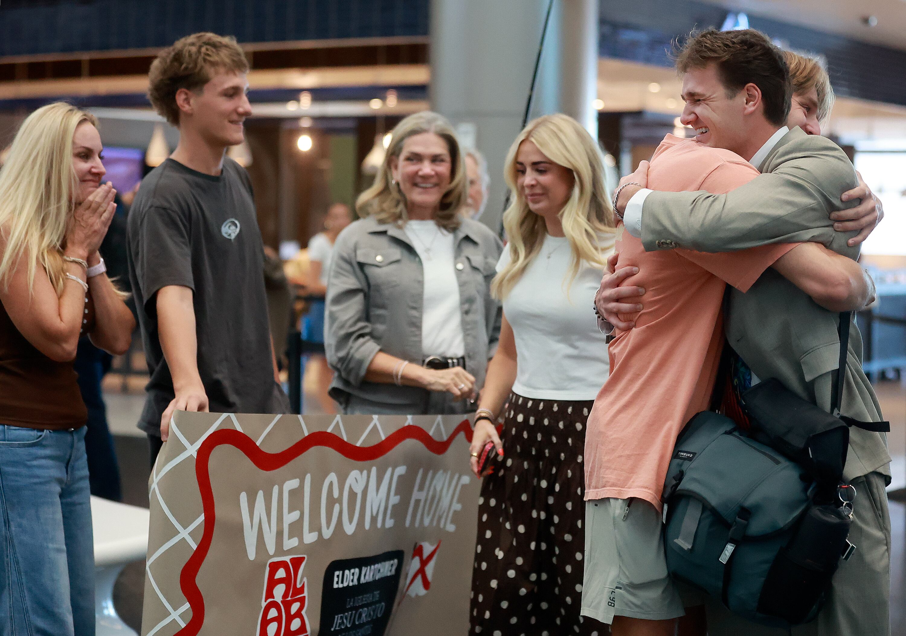 Jake Kartchner hugs his brother, Crew Kartchner, as Crew Kartchner returns home from a mission for The Church of Jesus Christ of Latter-day Saints at Salt Lake City International Airport, Wednesday. Some relatives of returning missionaries may not need to wait as long to see them with thanks to a new TSA program.