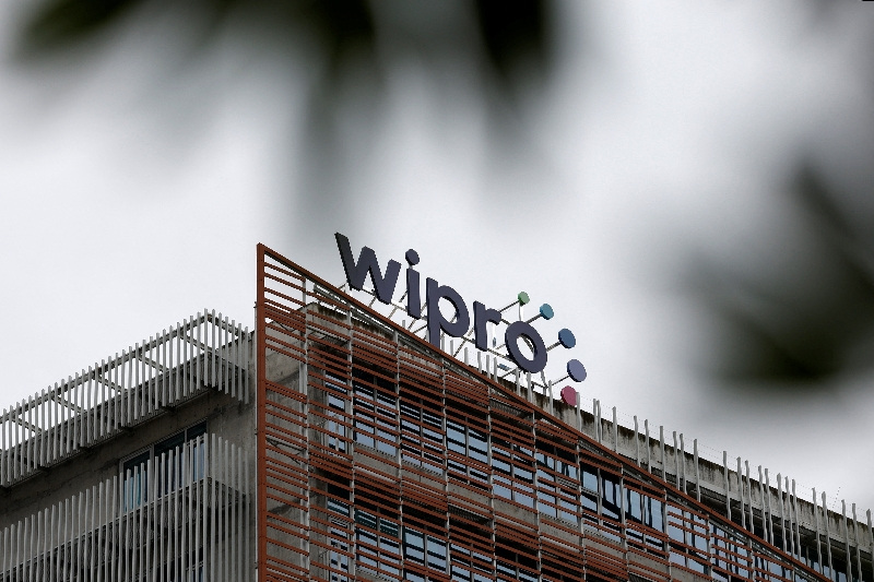 The logo of Wipro is displayed inside its premises in Bengaluru, India, August 13, 2025.