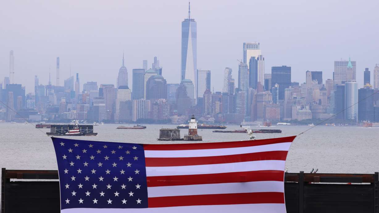 A general view of the New York skyline during an FDNY memorial to commemorate the 25th anniversary of the 9/11 attacks, Wednesday, in Staten Island. Two American flags are being carried by runners to Ground Zero from Boston as a tribute to 9/11.