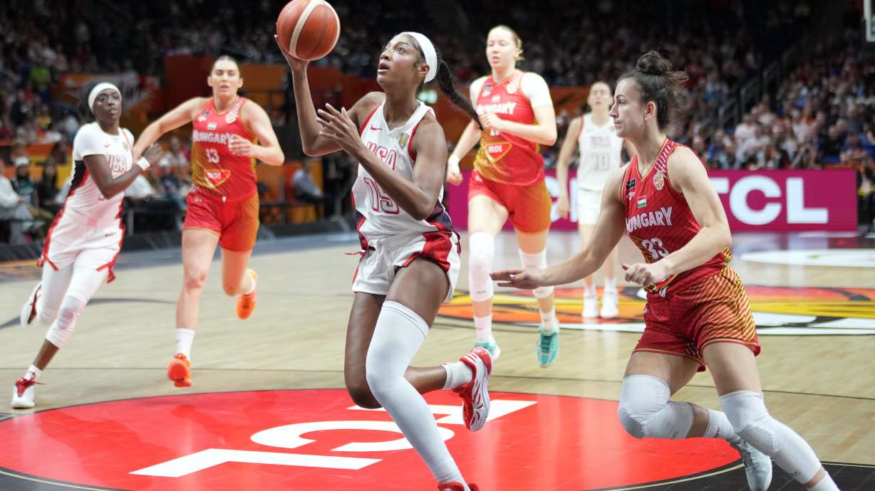 Angel Reese, of the United States, gies for a shot in front pf Hungary's Panka Dul during the Women's Basketball World Cup quarterfinal match between the United States and Hungary in Berlin, Thursday, Sept. 10, 2026.