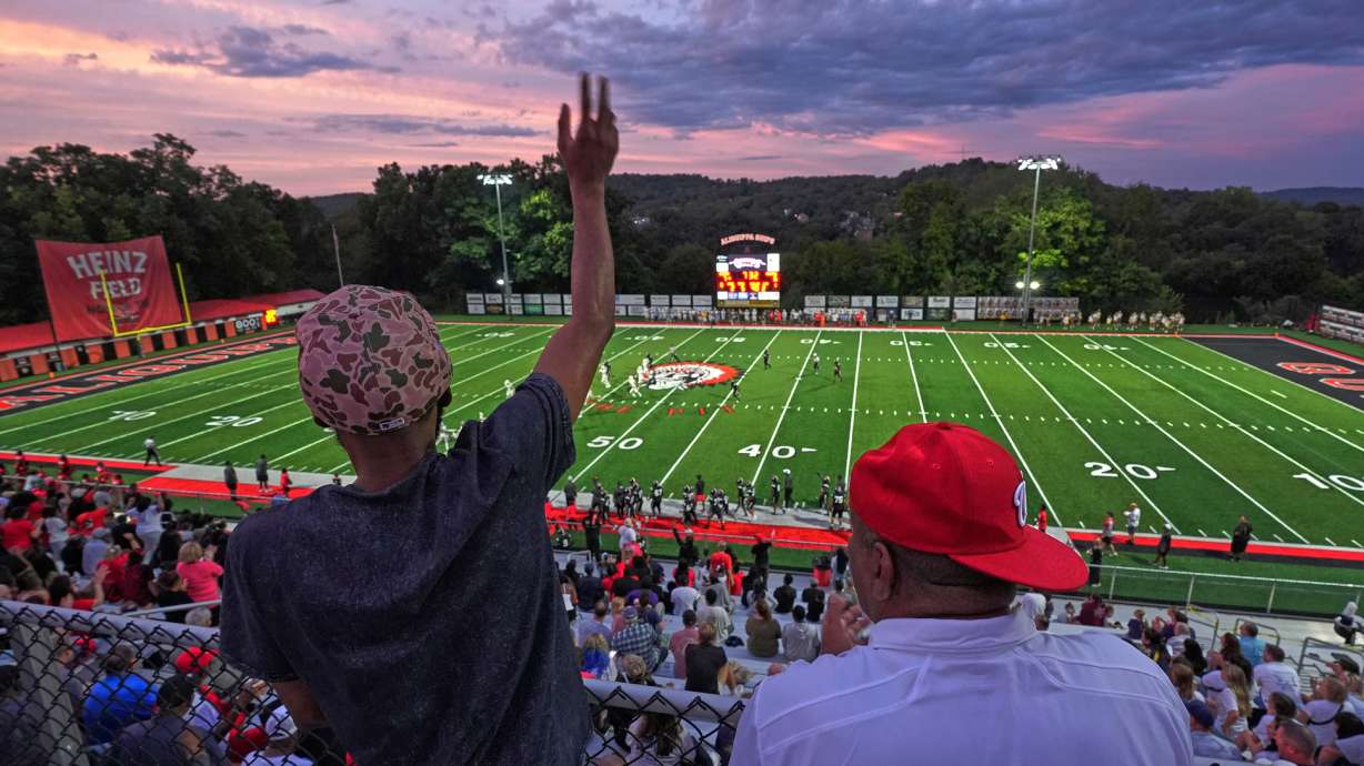 Aliquippa High School football fans cheer during a high school football game between Aliquippa and Mars high schools at Heinz Field in Aliquippa, Pa., Friday, Sept. 4, 2026.