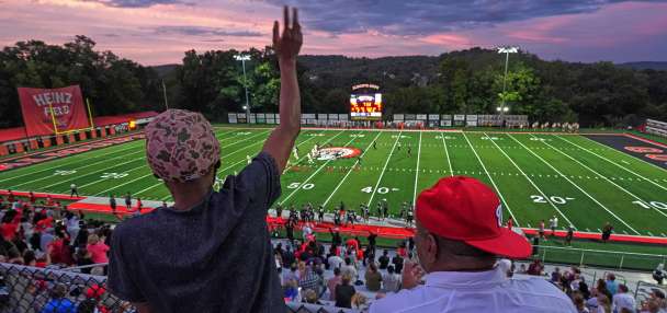 Across the US, 'Friday night lights' provide a sense of community — and, for some, a way out