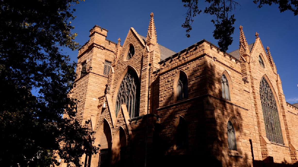 The First Presbyterian Church of Salt Lake City was built out of red sandstone on C Street.