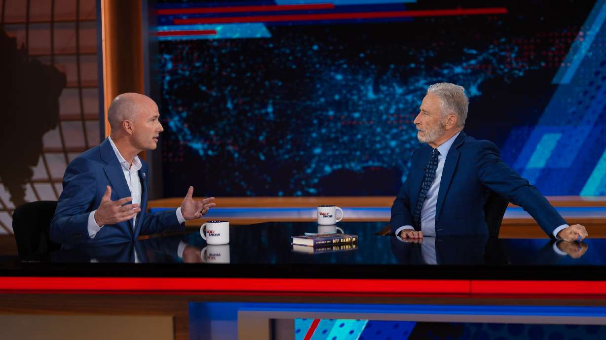 Utah Gov. Spencer Cox is interviewed by comedian and host of "The Daily Show" Jon Stewart in New York City in a segment that aired on Tuesday.