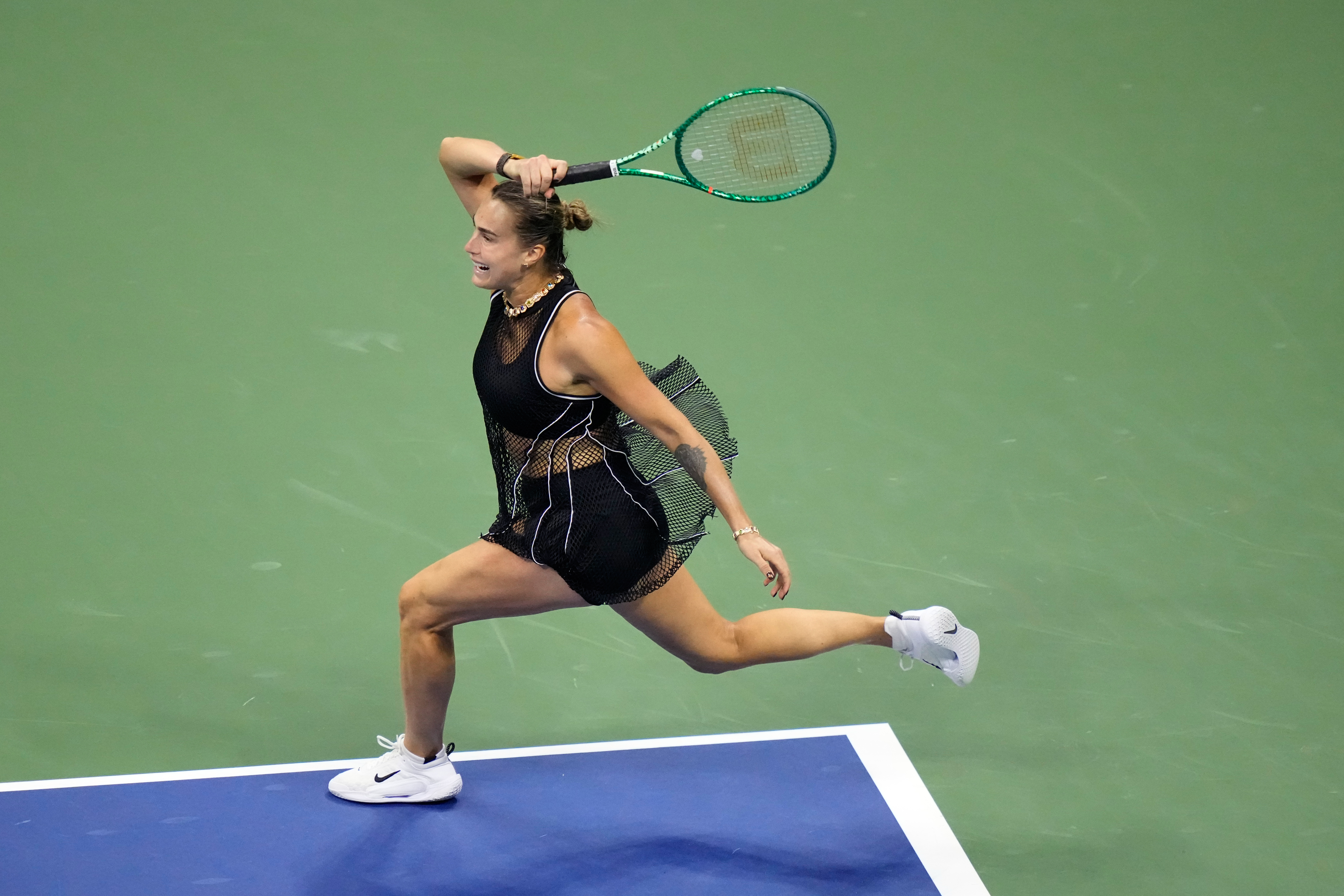 Aryna Sabalenka, of Belarus, follows through on a shot to Jessica Pegula, of the United States, during the women's singles semifinals of the U.S. Open tennis championships Thursday, Sept. 10, 2026, in New York. 