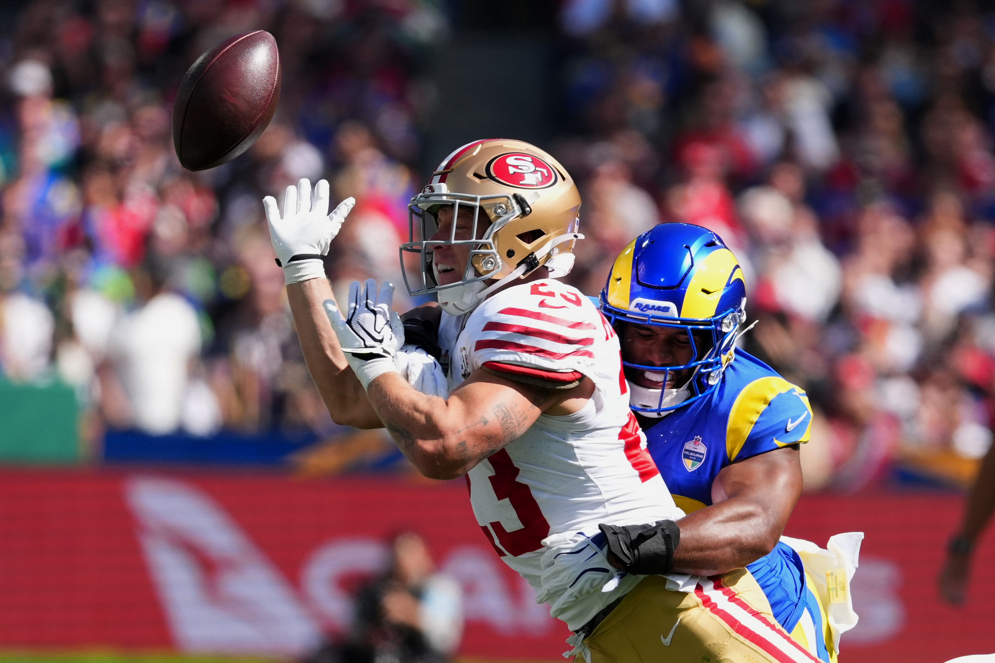 Los Angeles Rams linebacker Omar Speights breaks up a pass intended for San Francisco 49ers running back Christian McCaffrey during the first half of an NFL football game, Friday, Sept. 11, 2026, in Melbourne, Australia. 