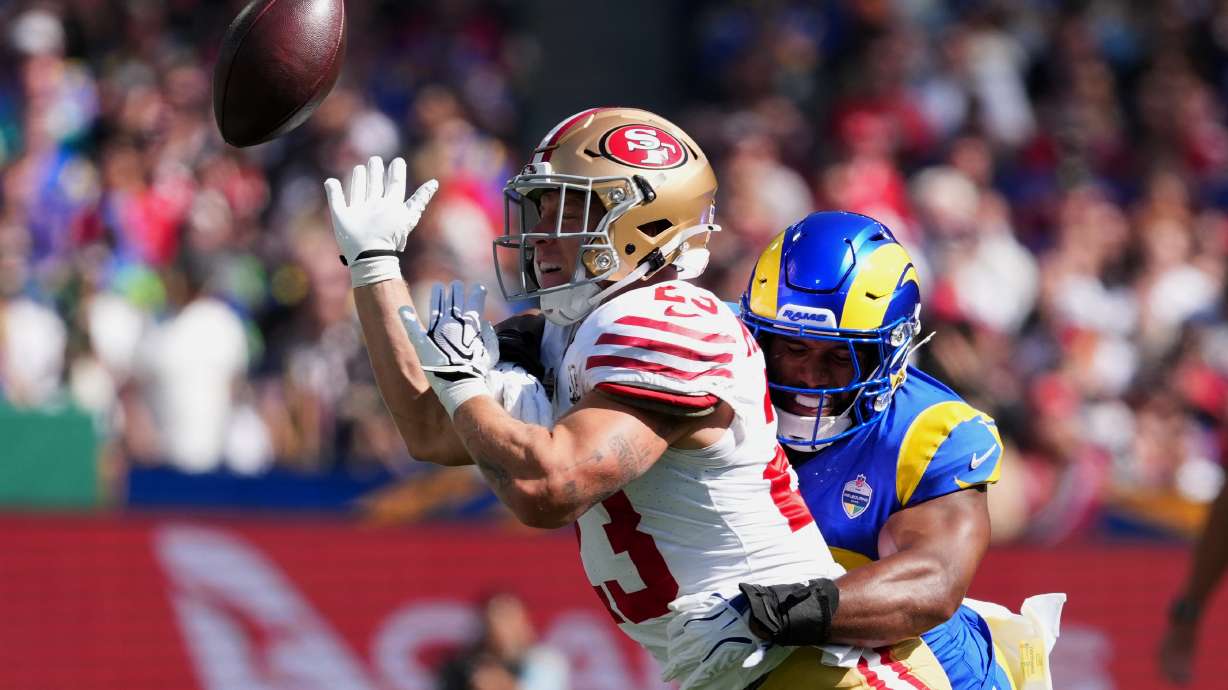 Los Angeles Rams linebacker Omar Speights breaks up a pass intended for San Francisco 49ers running back Christian McCaffrey during the first half of an NFL football game, Friday, Sept. 11, 2026, in Melbourne, Australia.