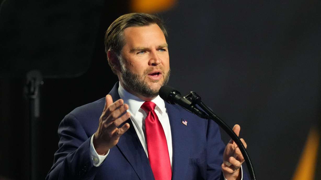 Vice President JD Vance arrives on the stage at the Republican convention on Thursday in Dallas. Vance highlighted the importance of restoring the nuclear family and traditional marriage.