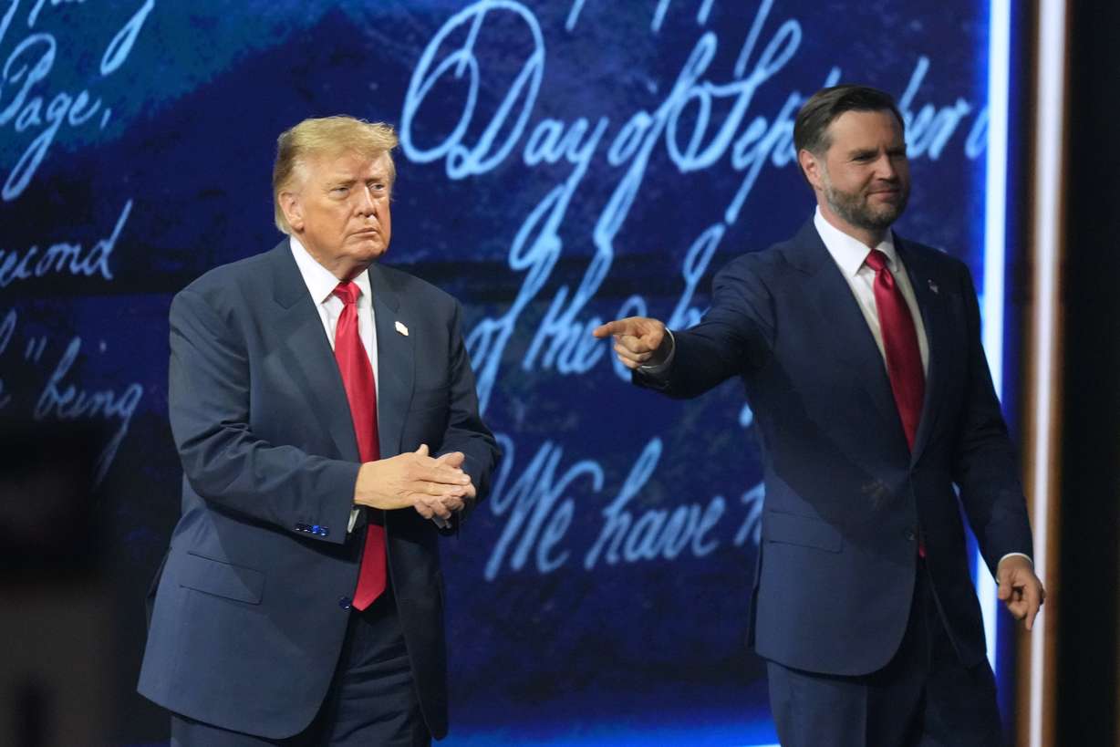 Vice President JD Vance points to President Donald Trump at the Republican convention on Thursday in Dallas, Texas. Vance was followed by Trump in speaking on Thursday.