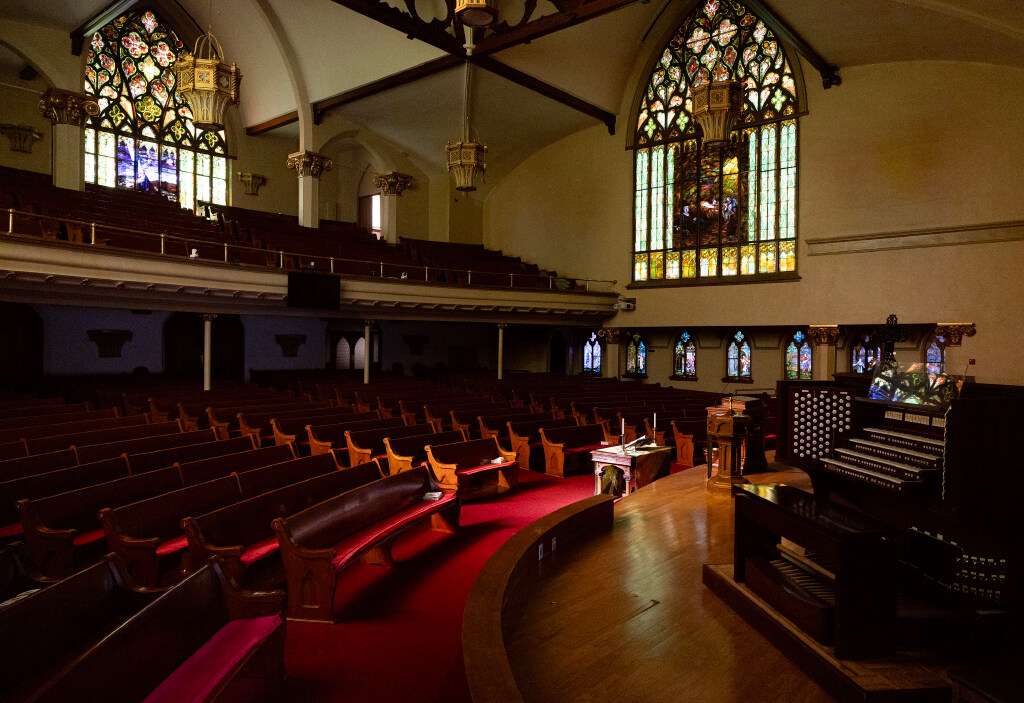 The interior of the nave of the First Presbyterian Church was lit by sunlight on Wednesday.
