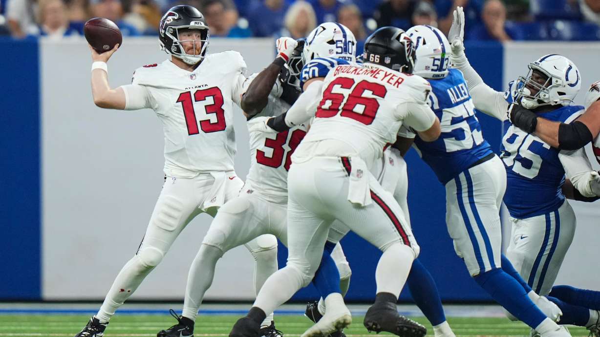 Atlanta Falcons quarterback Cooper Rush (13) throws against the Indianapolis Colts during the first half of an NFL football game in Indianapolis, Saturday, Aug. 22, 2026.