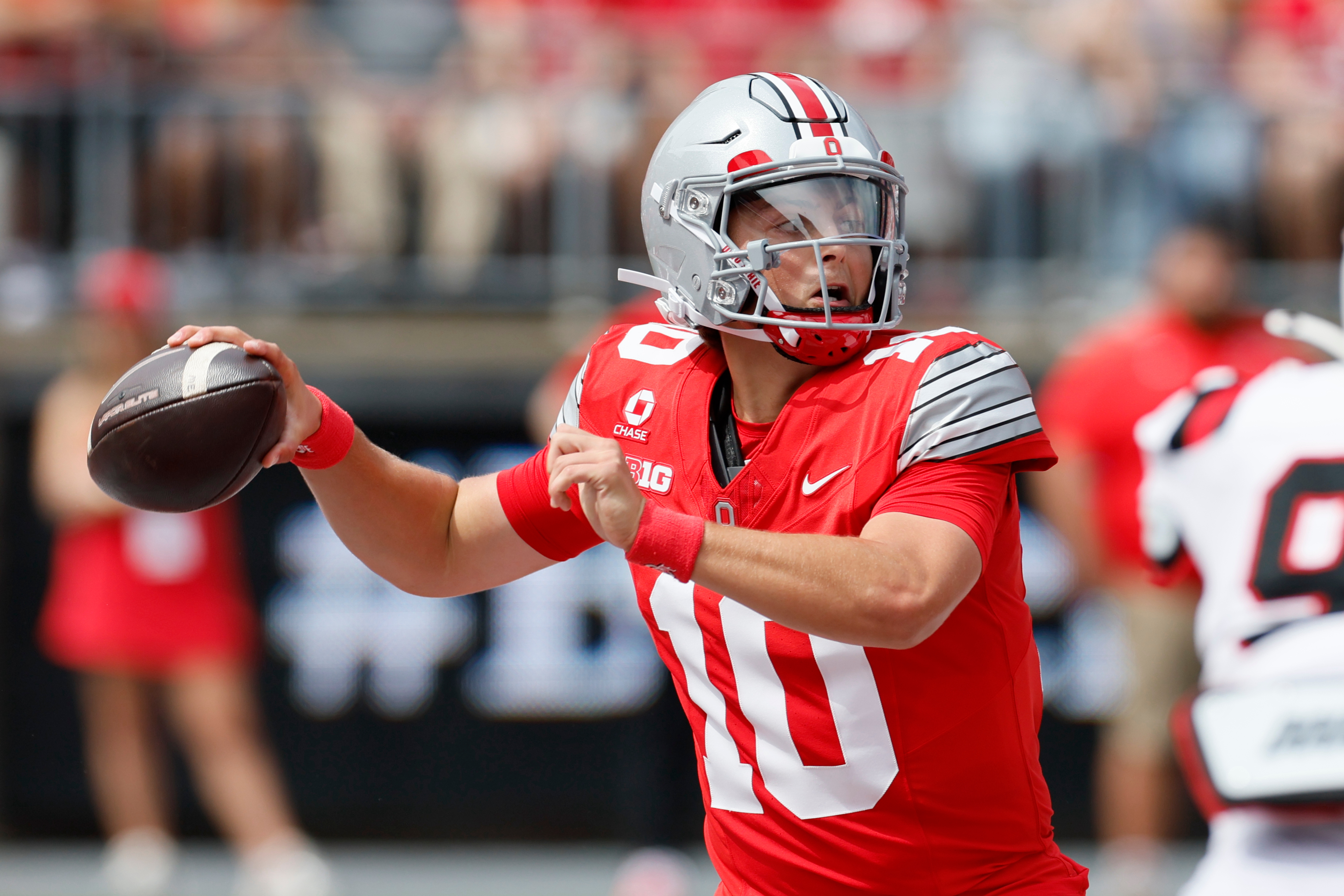 Ohio State quarterback Julian Sayin throws a pass against Ball State during the first half of an NCAA college football game, Saturday, Sept. 5, 2026, in Columbus, Ohio. 