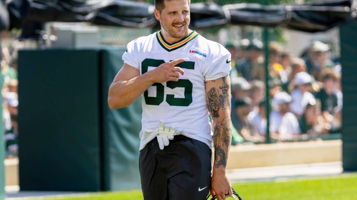 FILE - Green Bay Packers tight end Tucker Kraft points during the NFL football team's training camp, Aug. 2, 2026, in Green Bay, Wis.
