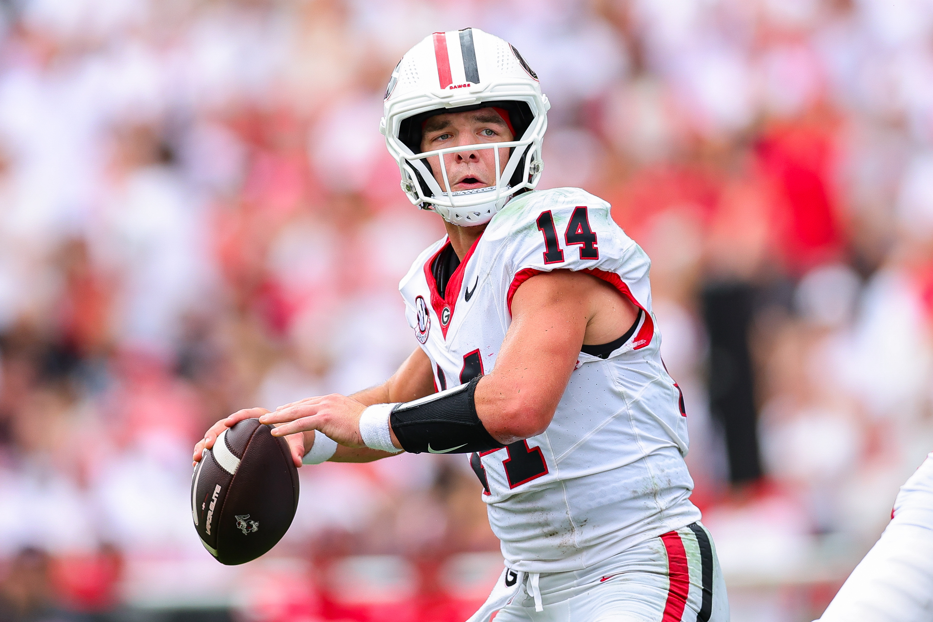 Georgia quarterback Gunner Stockton (14) looks to throw during the first half of an NCAA college football game against Western Kentucky, Saturday, Sept. 12, 2026, in Athens, Ga. 
