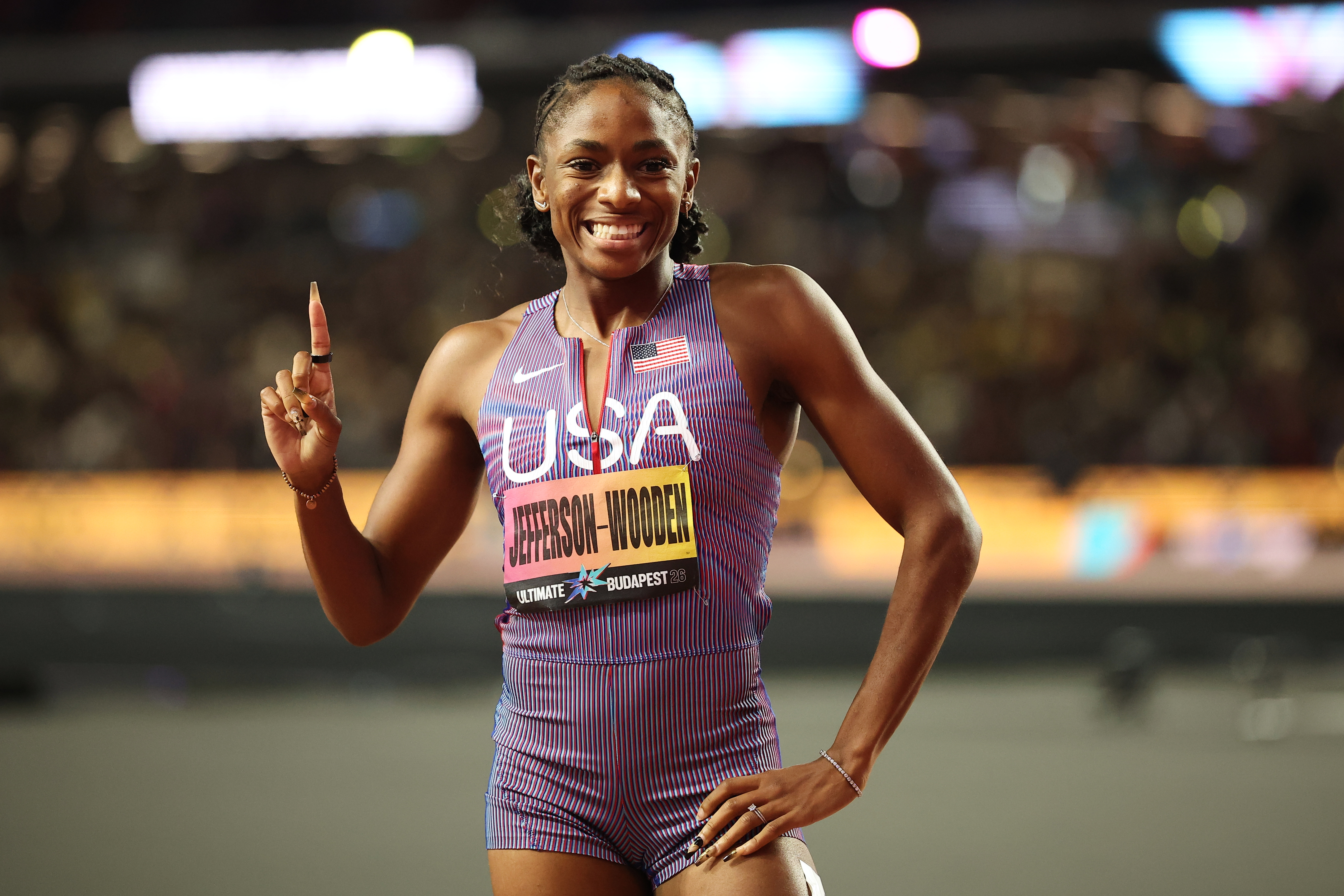 Melissa Jefferson-Wooden, of the United States, celebrates after winning the women's 100 meters final and posting a world-leading time during the World Athletics Ultimate Championship in Budapest, Hungary, Saturday, Sept. 12, 2026. 