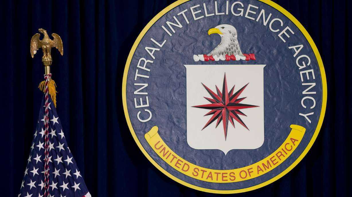 A former CIA official found with $40 million of gold bars in his home has reached a tentative plea agreement after being charged with theft for fraudulently inflating his salary, according to court records.