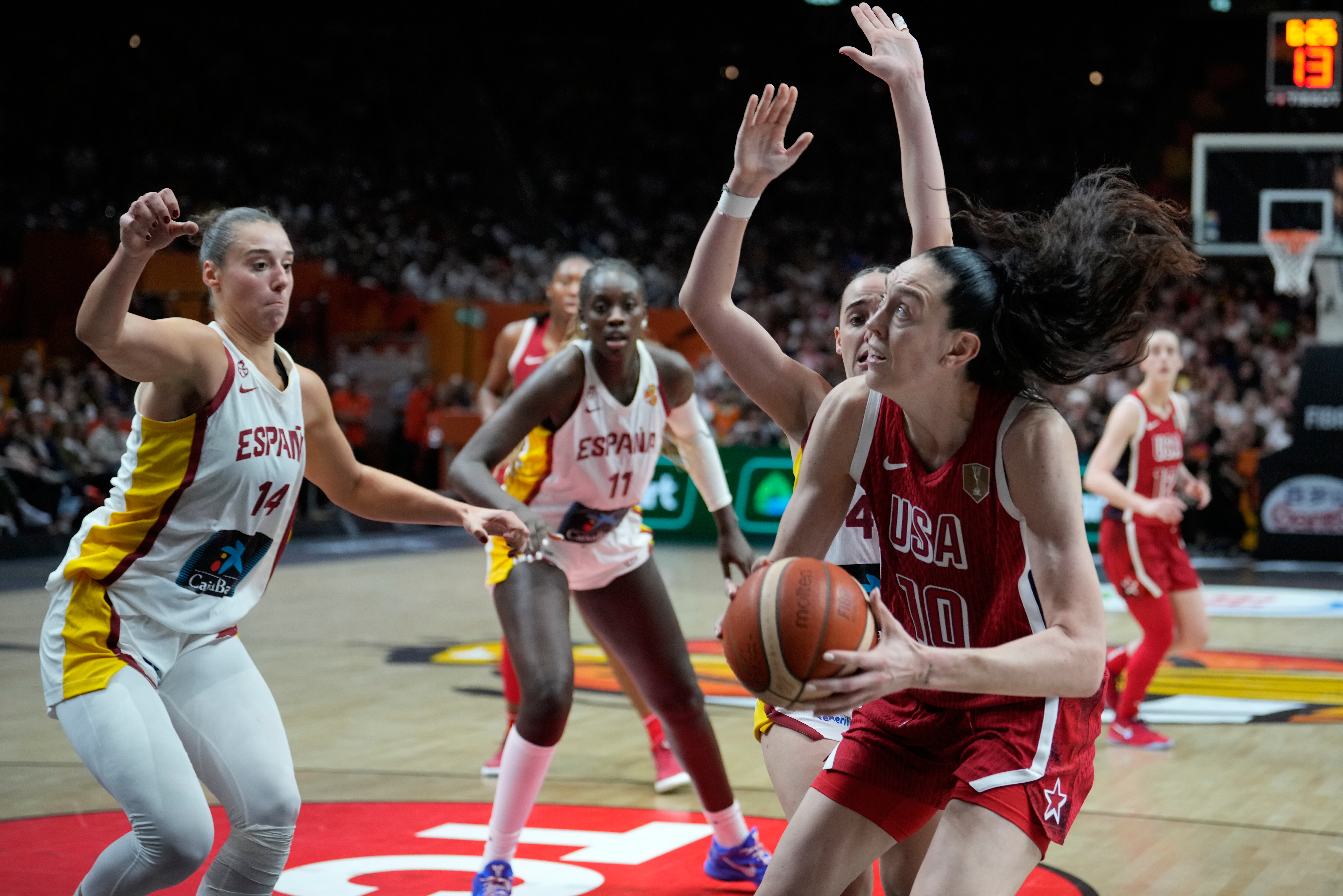 Breanna Stewart, of the United States, goes for a sshot over Spain's Raquel Carrera during the Women's Basketball World Cup semifinal match between the United States and Spain in Berlin, Saturday, Sept. 12, 2026. 