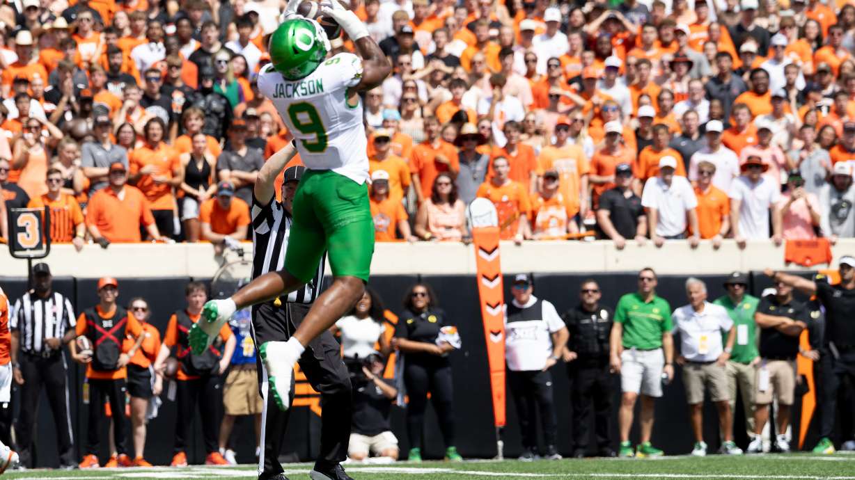 Oregon linebacker Devon Jackson (9) intercepts the ball in the first half the NCAA college football game against Oklahoma State in Stillwater, Okla., Saturday, Sept. 12, 2026.