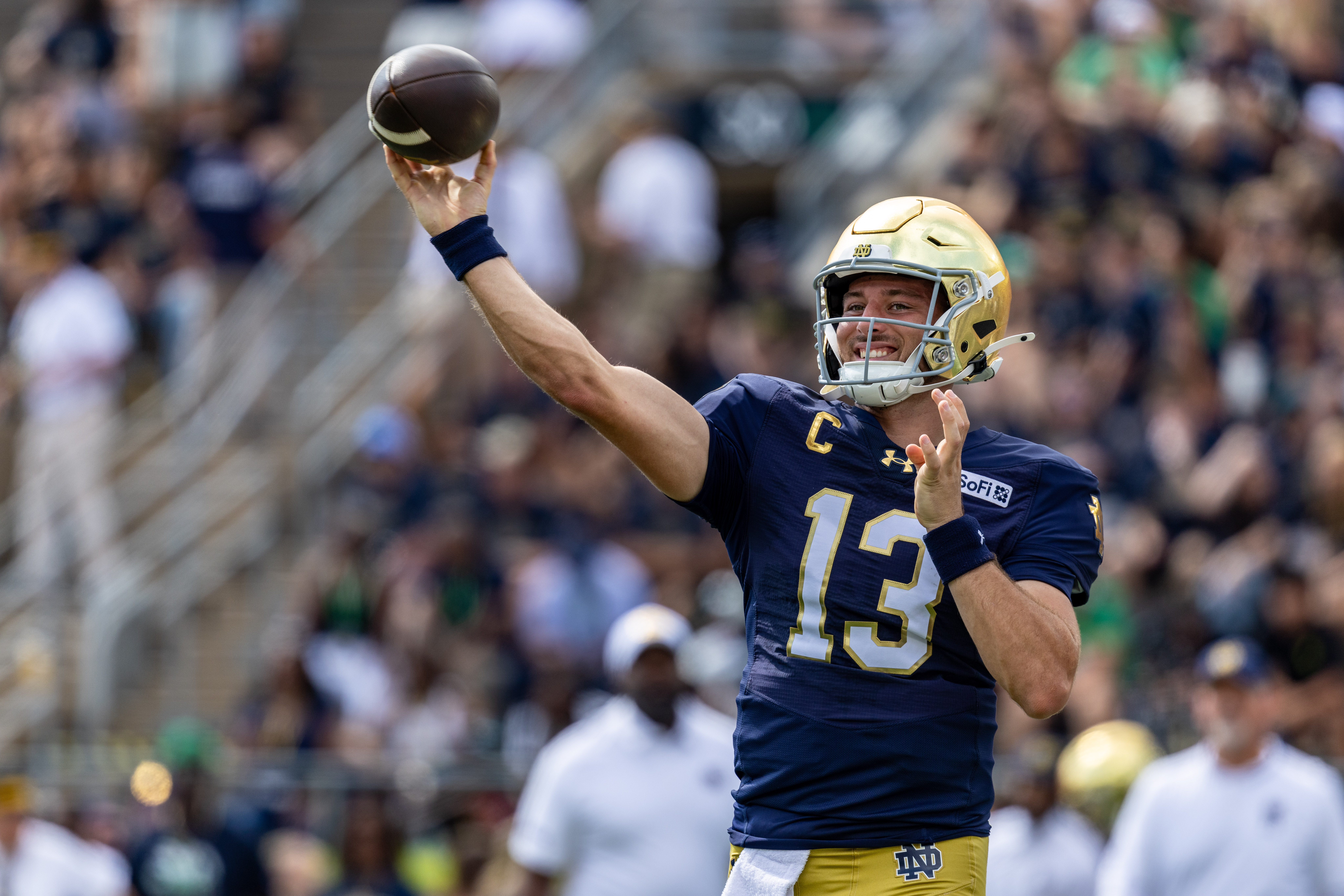 Notre Dame quarterback CJ Carr (13) throws before an NCAA college football game against Rice, Saturday, Sept. 12, 2026, in South Bend, Ind. 