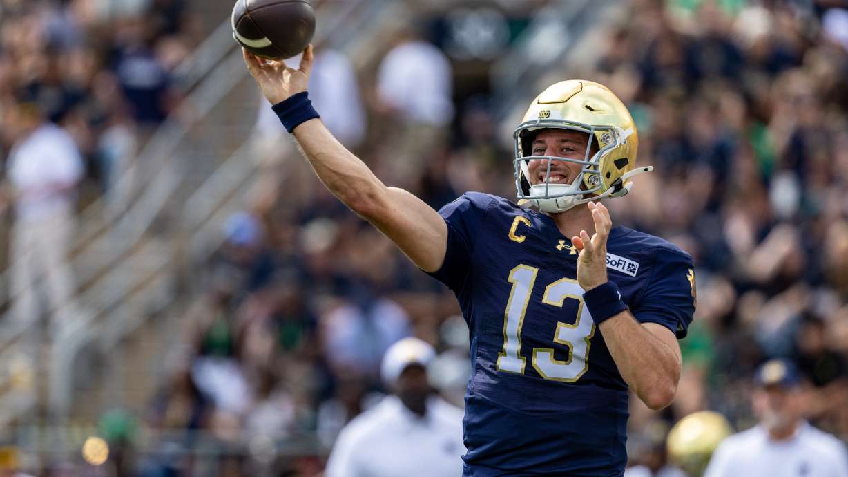 Notre Dame quarterback CJ Carr (13) throws before an NCAA college football game against Rice, Saturday, Sept. 12, 2026, in South Bend, Ind.