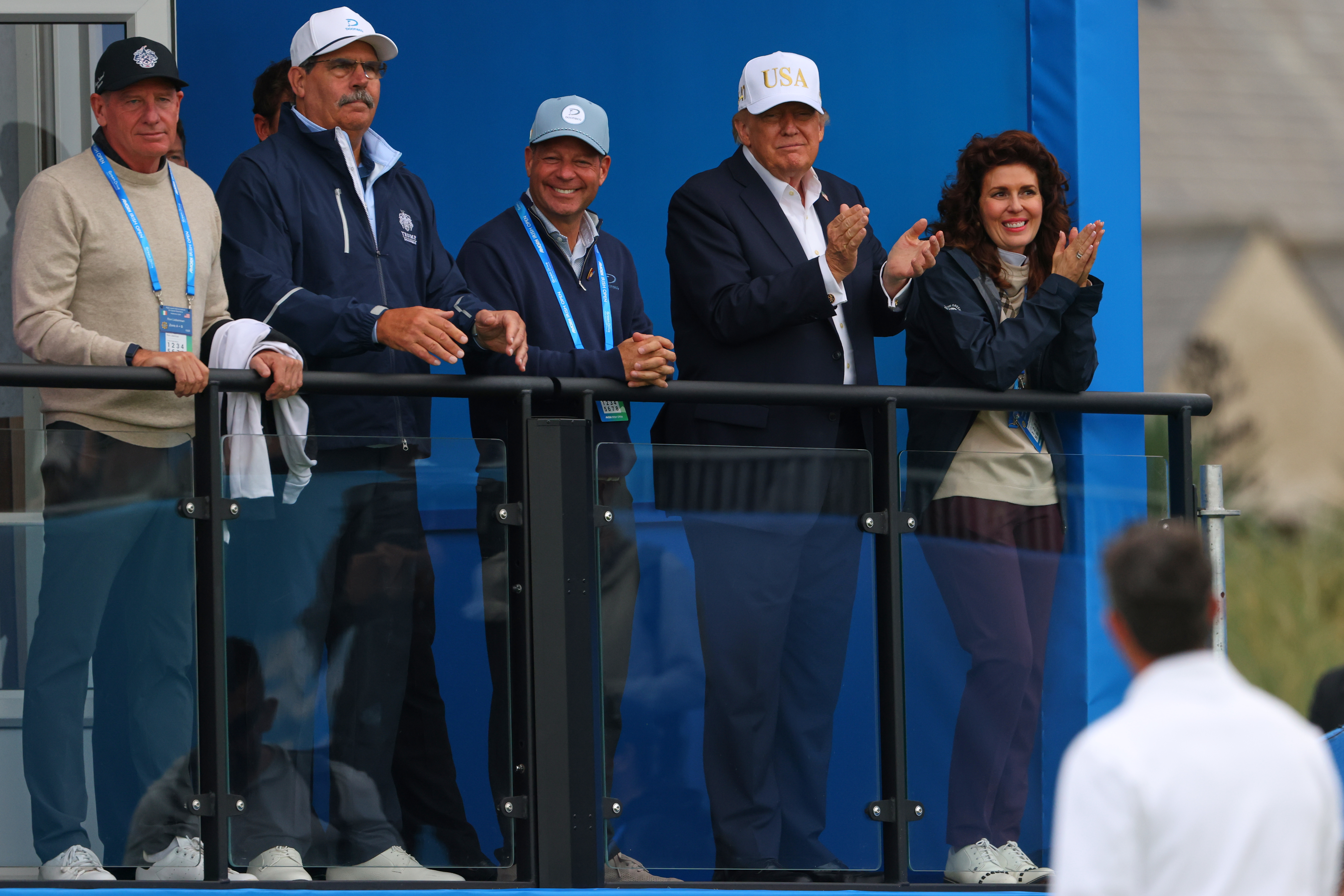 U.S. President Donald Trump applauds to golfer Rory McIlroy of Northern Ireland during the Irish Open at the Trump International Golf Links course in Doonbeg, Ireland, Saturday, Sept. 12, 2026.